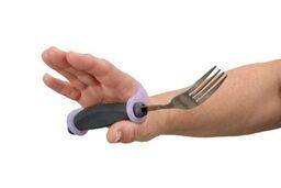 An adaptive handled fork with a lavender eazyhold securing it to a hand that has trouble holding objects.
